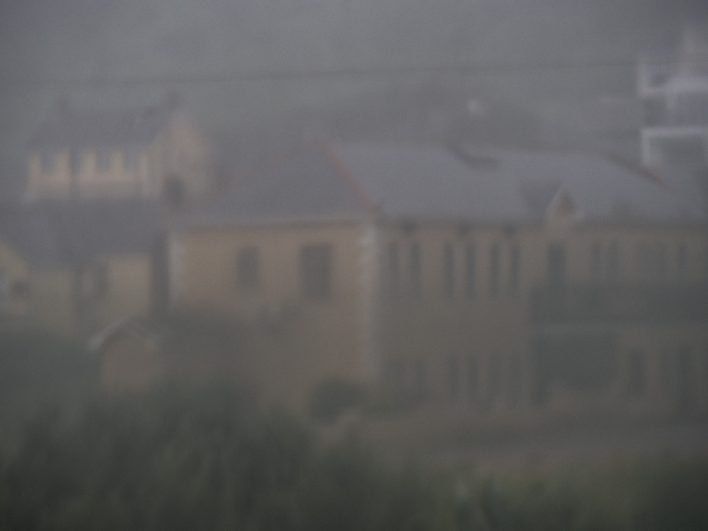 Through the mist.