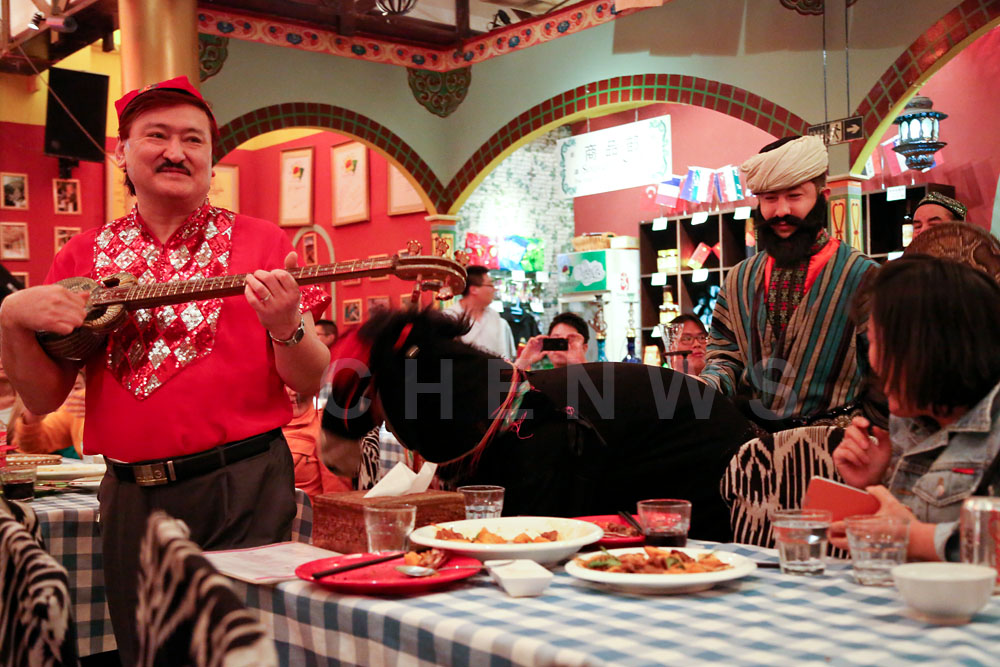 Uyghurs performing in a restaurant in Beijing