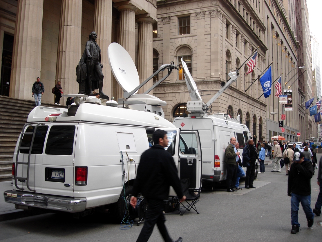 Reporters vans at Wall Street