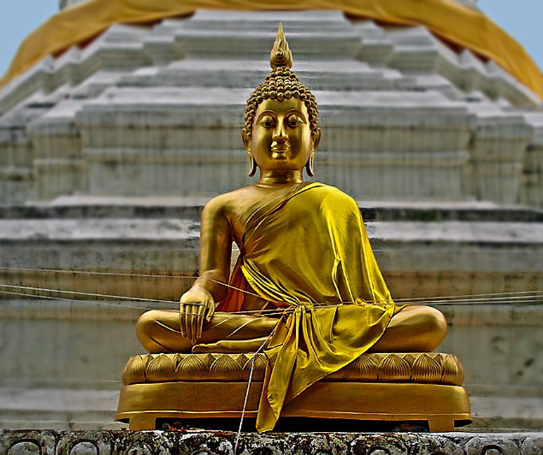 Buddha image with strings attached