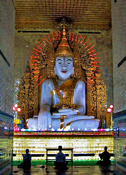 The Buddha being worshiped