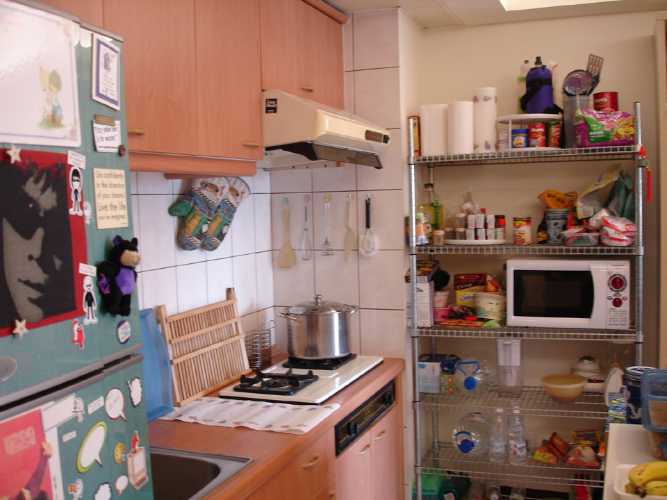 From bathroom into kitchen.