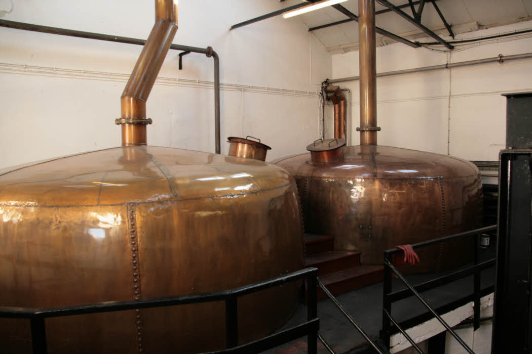 Inside the Bowmore Distillery - the hot water storage tanks