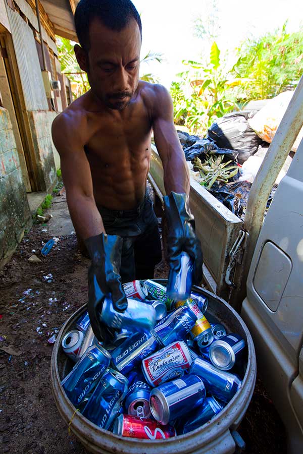Joe Samuel sorting aluminum cans for recycling. IMG_2131.jpg