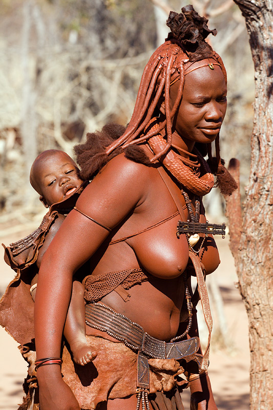 Himba Mother Carrying Child