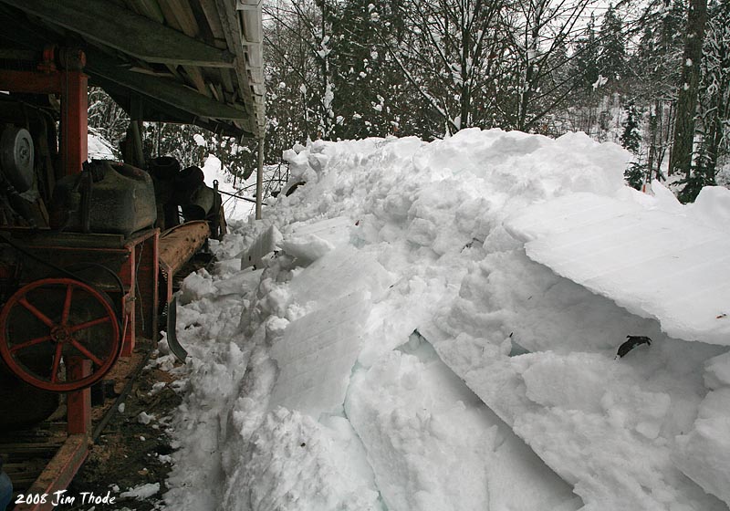 Sawmill with more snow on the roof to come down