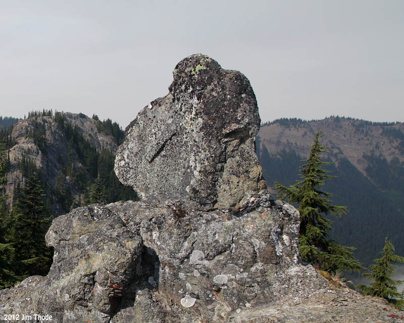 The Watcher  with the arch in the background