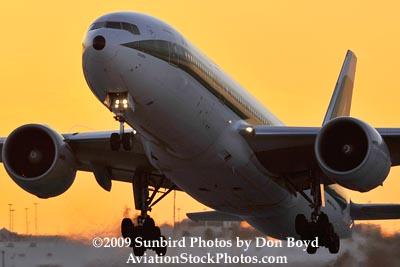 Alitalia B777-243/ER EI-DDH lifting off near sunset at Miami International Airport aviation stock photo #3268