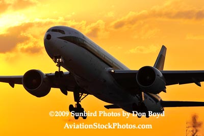 Alitalia B777-243/ER EI-DDH lifting off near sunset at Miami International Airport aviation stock photo #3269