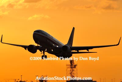 2009 - American Airlines B737-823 taking off at sunset aviation stock photo #3263
