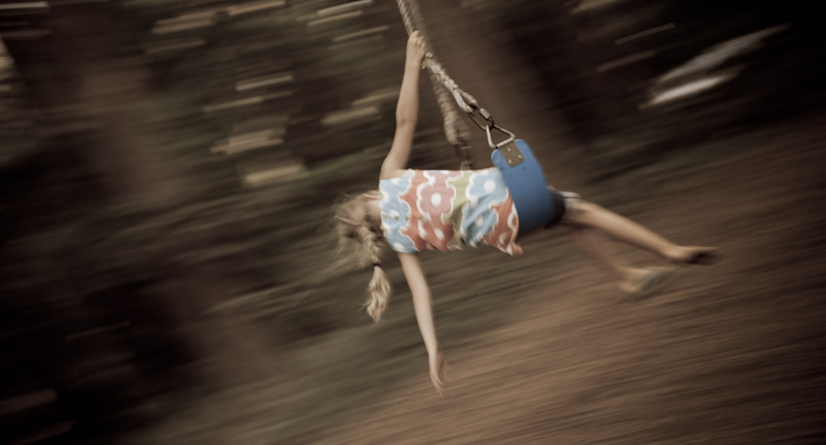 Girl On A Swing With One Shoe <br> (AV-082711-150-1.jpg)