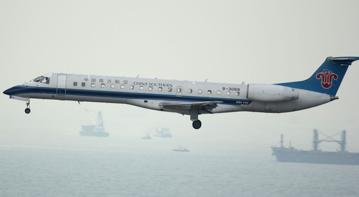 An almost empty China Southern E-145 arriving in HKG