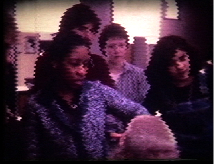 Etheline First black art director, presenting strong soire cut to staff in 1977.