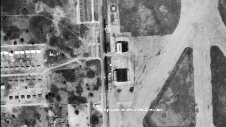 1952 - aerial closeup view of hangars adjacent to LeJeune Road at Amelia Earhart Field