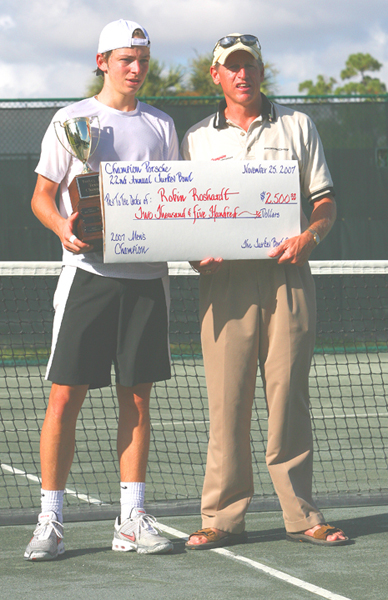 Robin Roshardt receiving check from Kieth Dunlop (director)