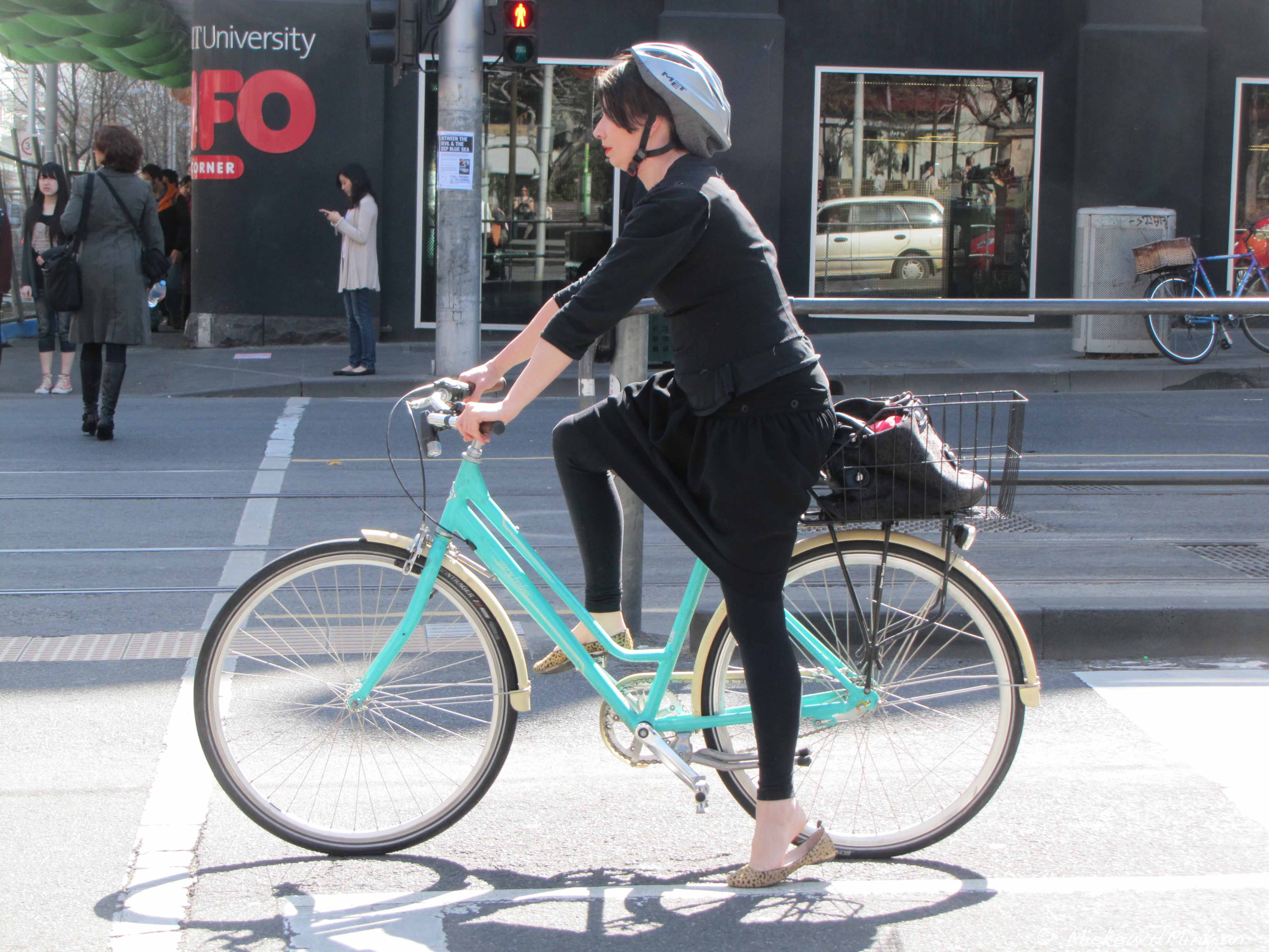 Woman on bike 3