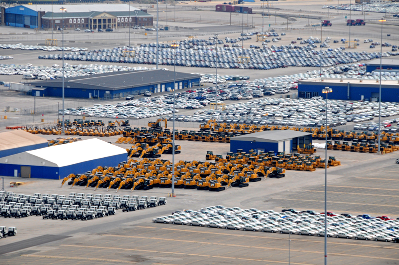 Earth moving equipment, trucks and other vehicles for shipment in Baltimore Harbor