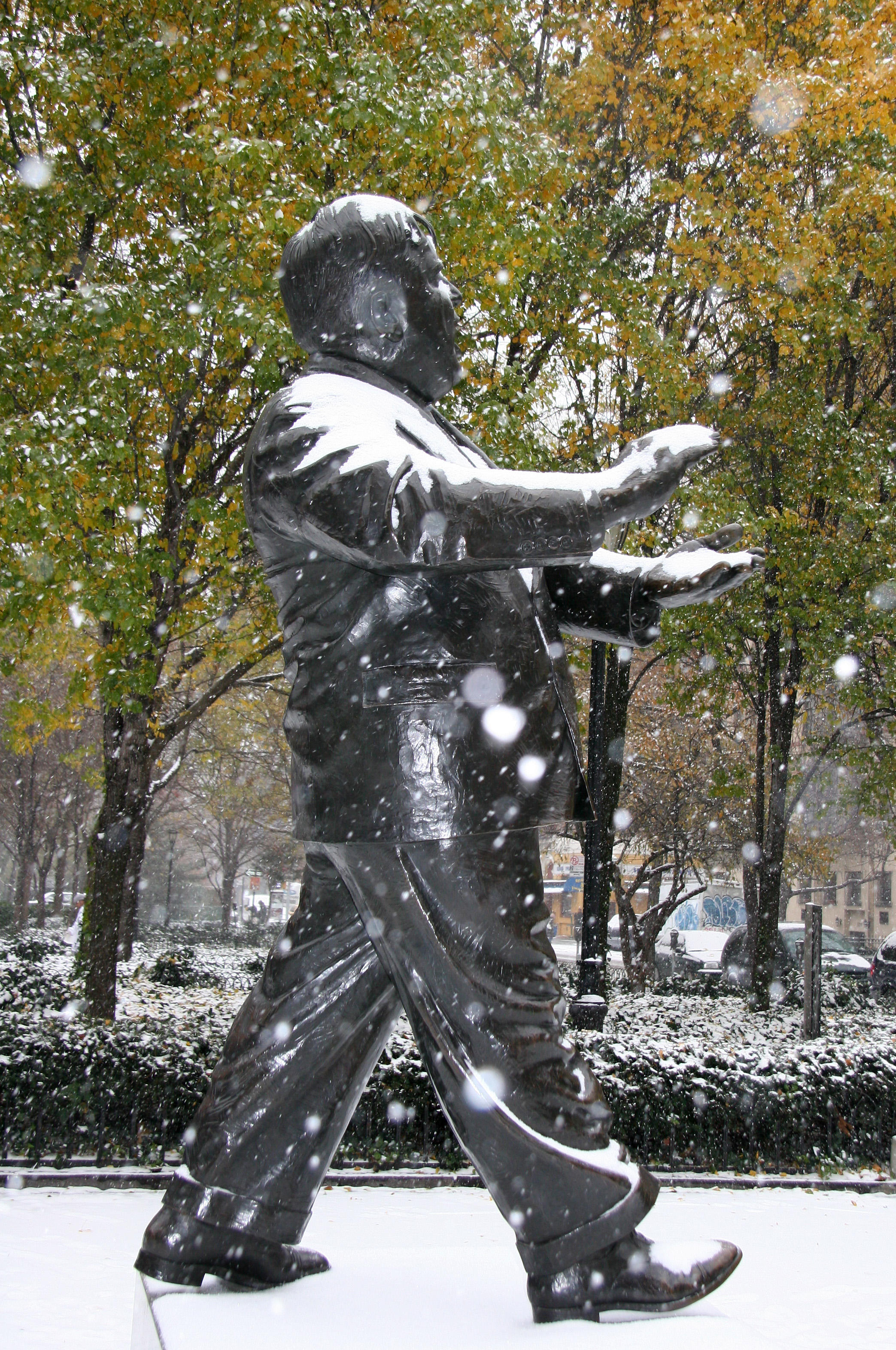 Mayor LaGuardia Statue in Snow Flurries & Pear Tree Foliage