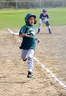 Braydens first t-ball game......heading to home plate!!