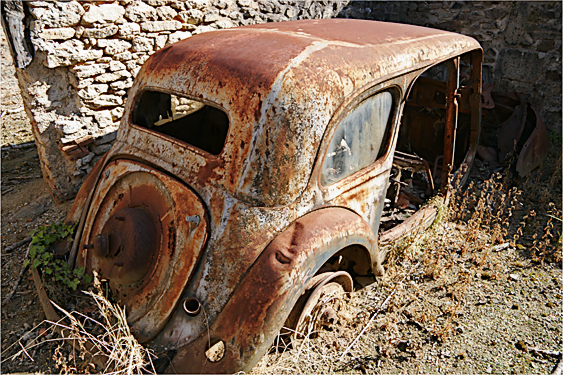 Burned Out Car In A Garage