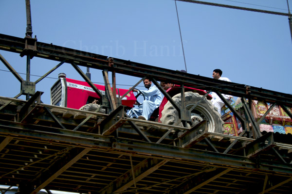 Tractor over bridge