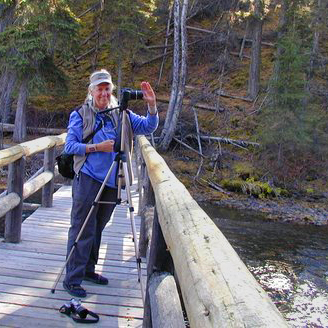 91010140 Teresa with cameras at Kintla Lake bridge a2c5x5.jpg
