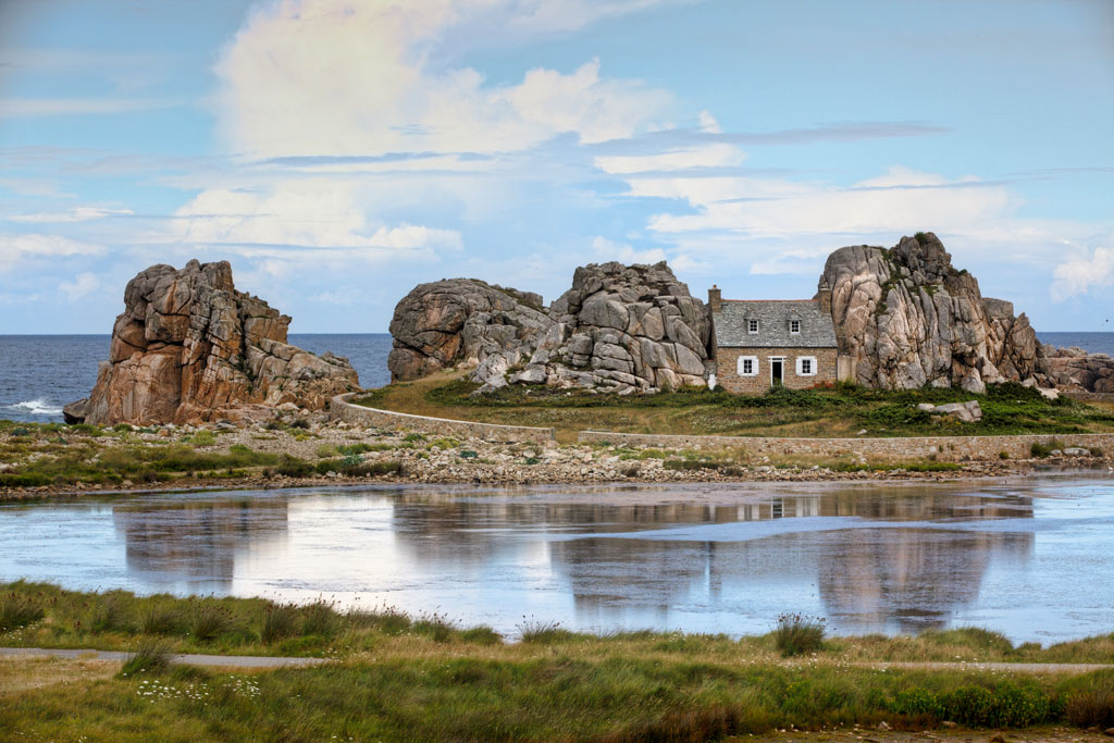 The famous house between rocks at the Cte de Granite Rose