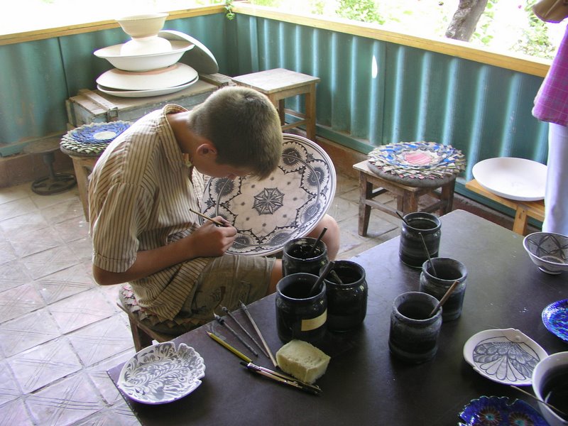 Rishton Pottery Factory (Fergana Valley, Uzbekistan) - young apprentice