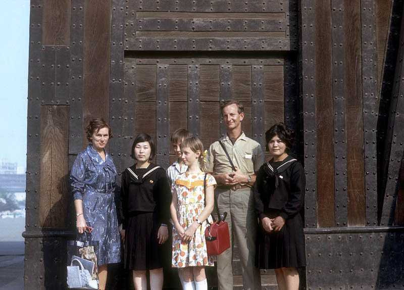 Family group at the gates of the Imperial Palace, Tokyo