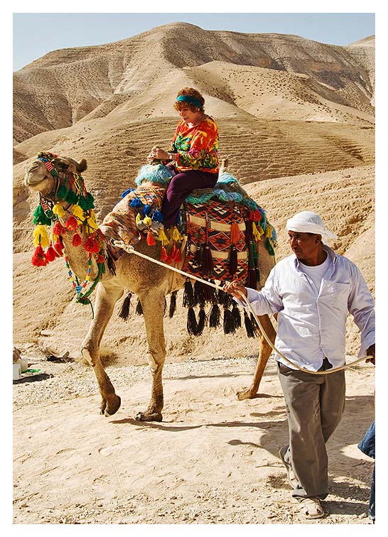 Our Bedouin Friend Assists us with the Camel