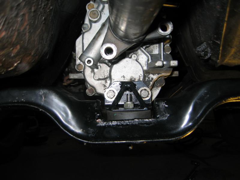 View of the modded crossmember  bracket in the car