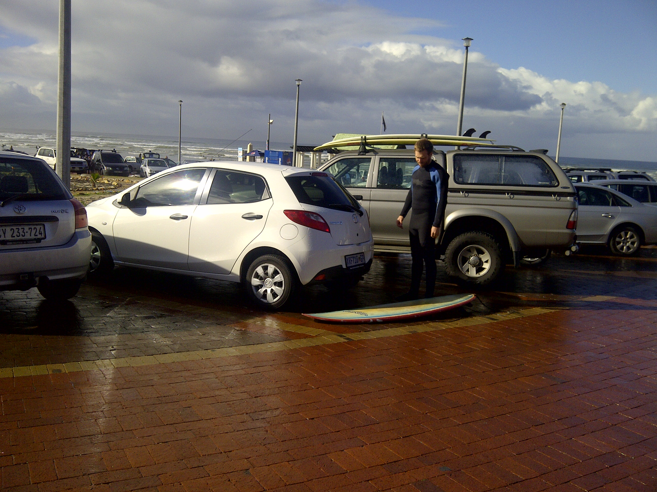 Getting ready to surf - Muizenberg Beach Parking Lot