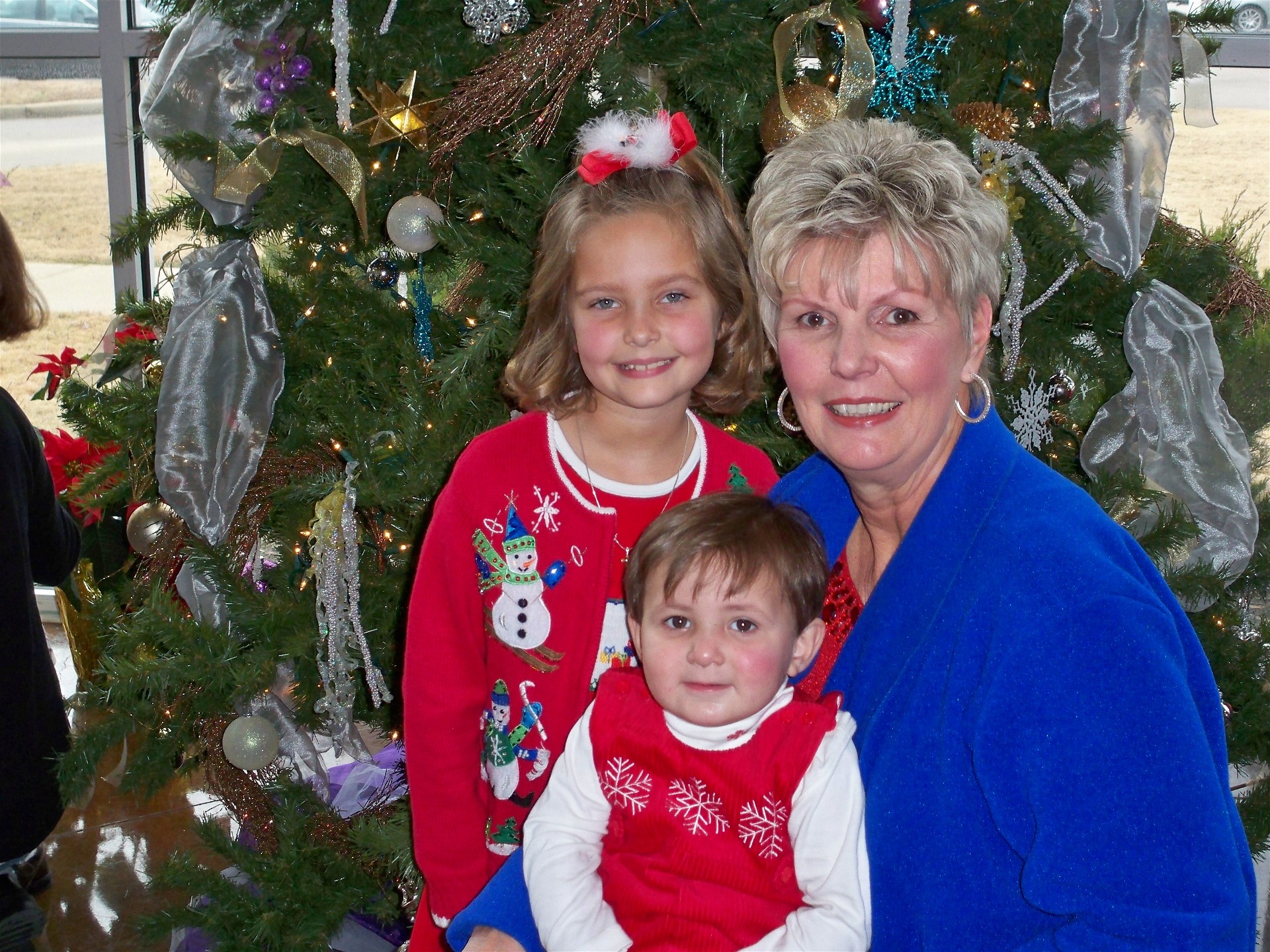 Christmas 08 Jo Ann Solomon, with grand children Taylor and Hunt.