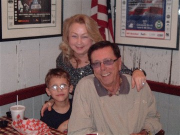 Johnny 'Dark' and Cynthia Cowgill Dougherty with grandson Bradley Jeans