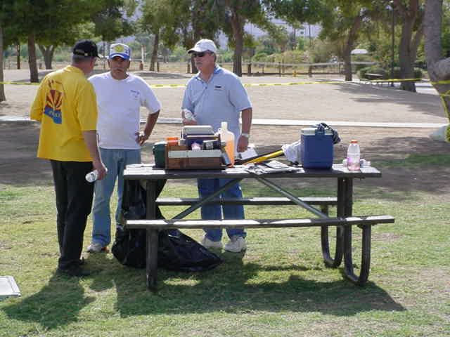 George discussing a plane<br>with Sergio and Jeff H