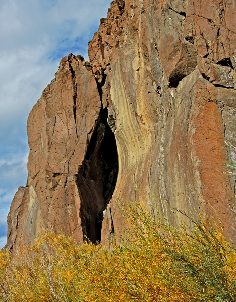 Unusual hole in mountain rock.
