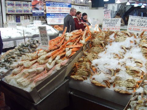 King crab and Dungress crab at fish market in Seattle Pikes Market.jpg