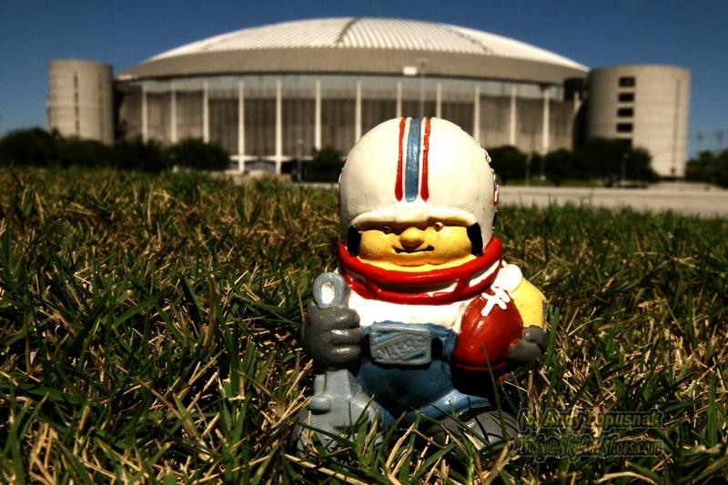 NFL Huddles: Houston Oilers figure in front of the AstroDome in Houston, Texas