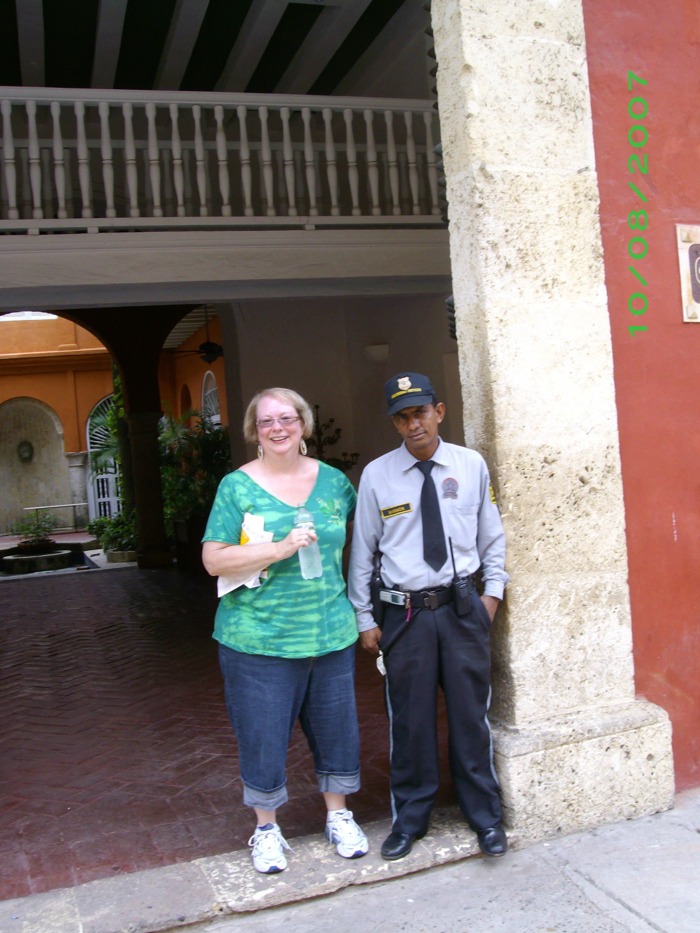 Jean chats it up with guard at government building