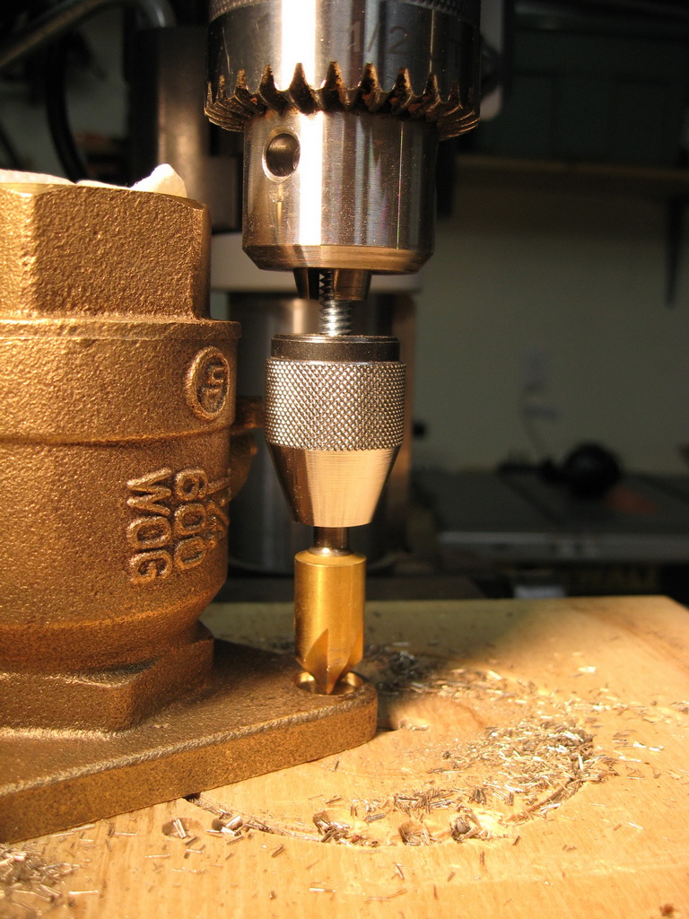 Mounting holes are countersunk to accept flathead woodscrews; extra chuck provides clearance.