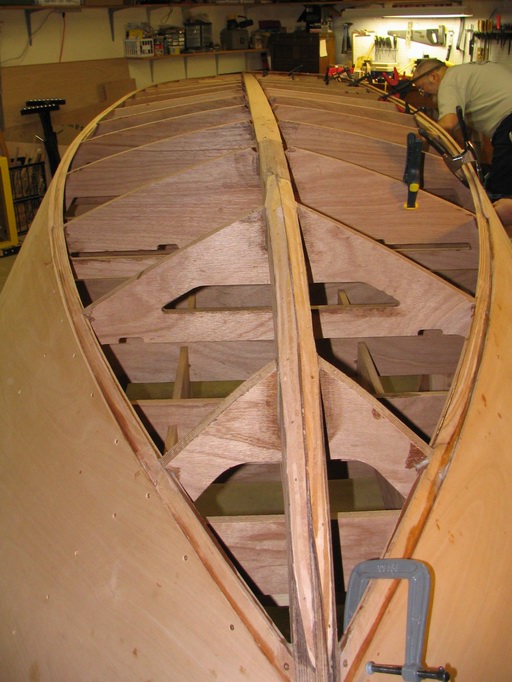Second side panel now attached.  Bottom panels go on after fitting spray rails and chine guards.
