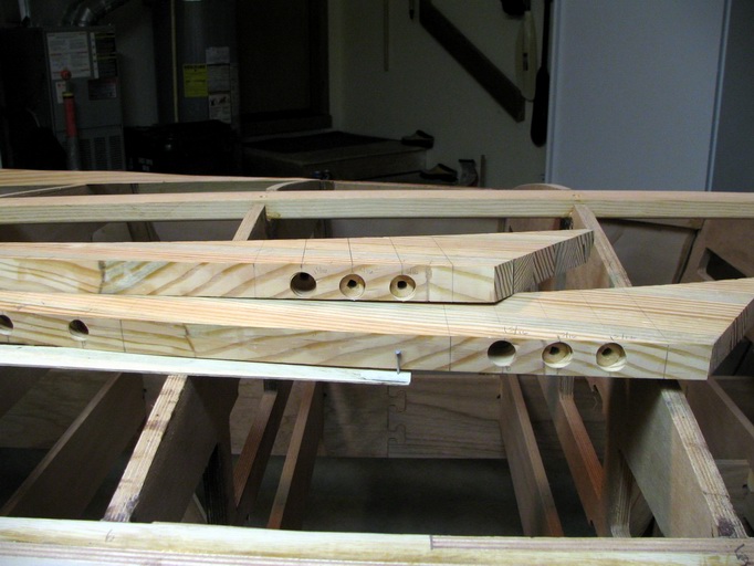 Mounting bolt holes for spray rail fillers.