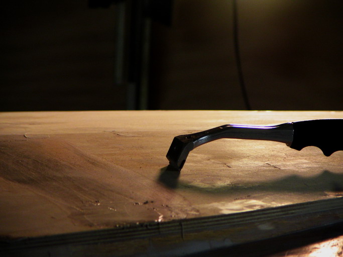 Scraper stage in fairing.  A carbide-bladed scraper saves sandpaper and avoids a lot of sanding dust.