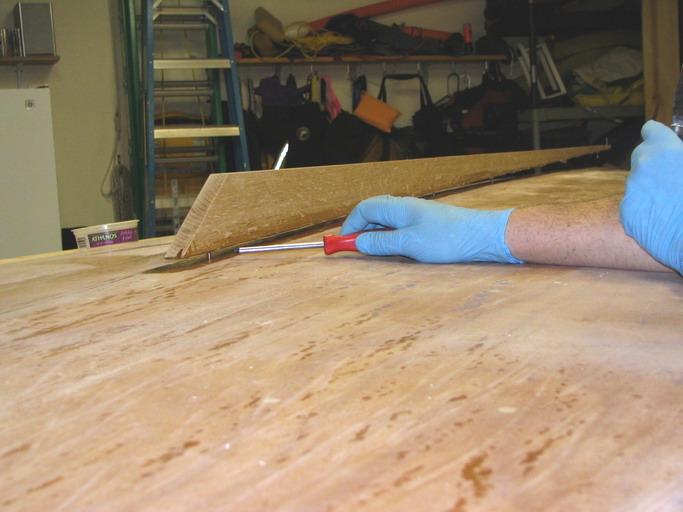 Rear piece of the keel, yucky with epoxy and sitting on screws prior to installation