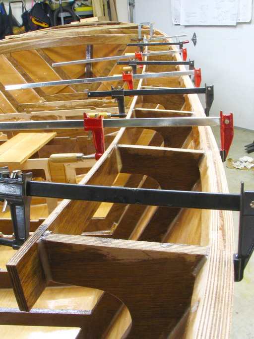 I used the jig beams for nailers, exploiting the puzzle joints to make a 12-foot piece for each side.  This is glueup.