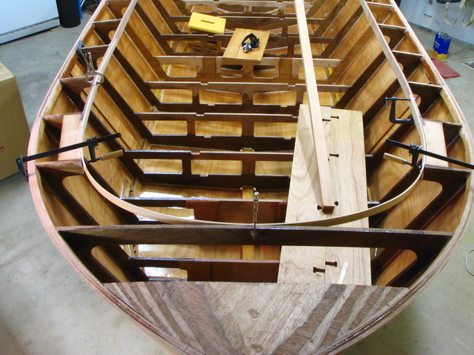 First set of two filler blocks support stern deck and define coaming curve.  Batten aids installation.