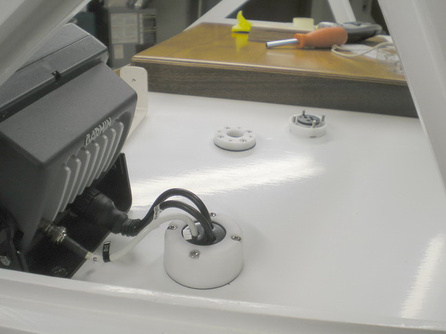 Larger clam passes connectors up to about 1.4 inches in OD.