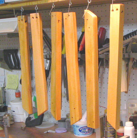 Fir crossovers for each tank frame position, curing from epoxy saturation.