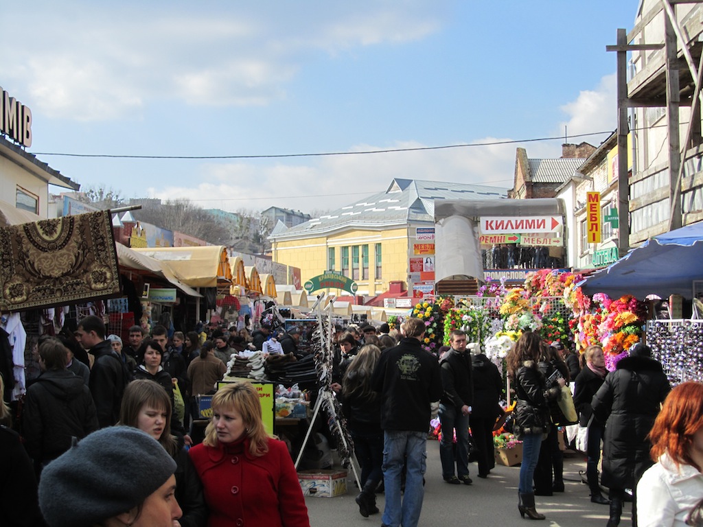 passing a dense outdoor market