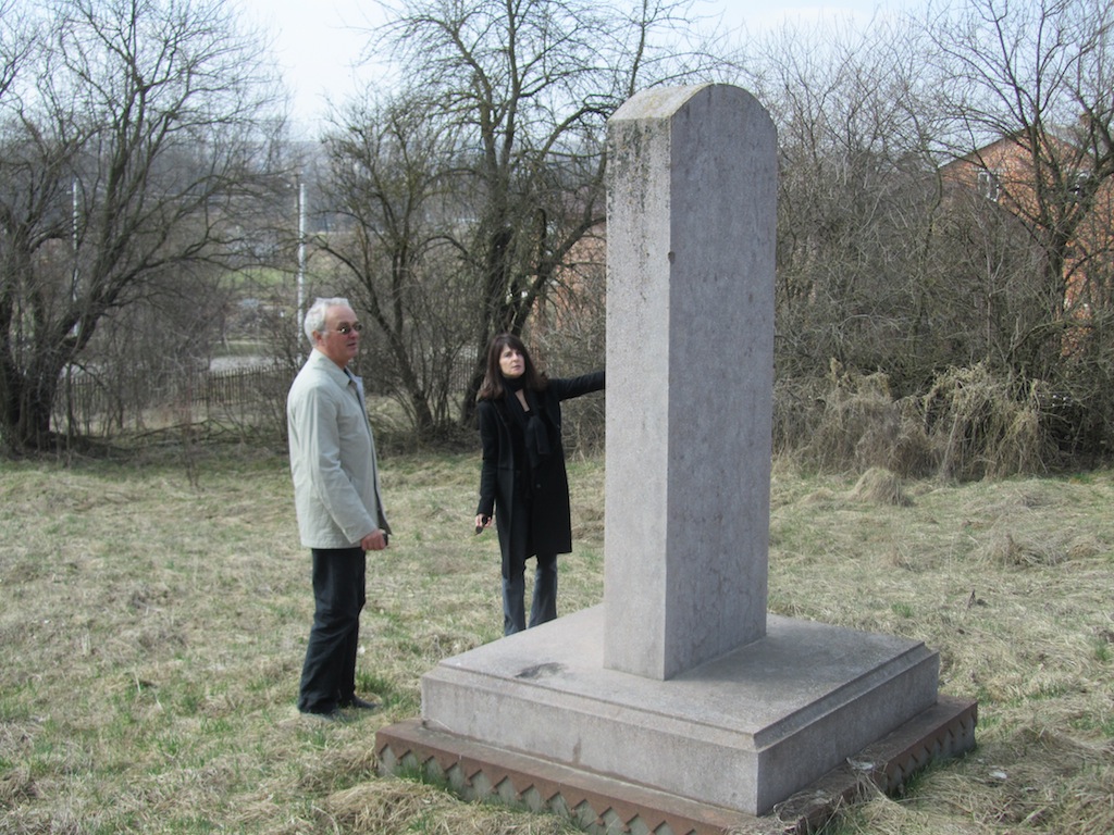 Marla with Alex D. at the cemetery memorial erected long after the war